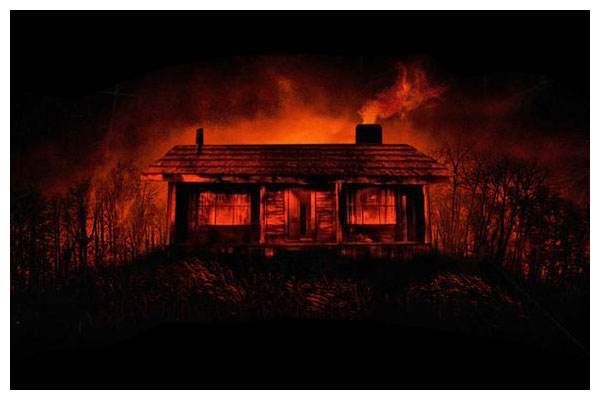 The Cabin In The Woods A promotion image where the Cabin looks to be engulfed in red flames.