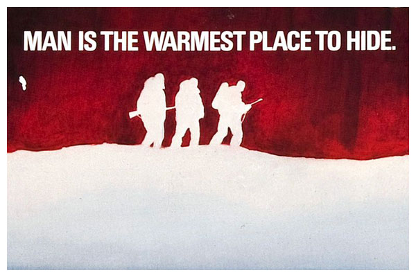 A graphic image from the Thing, featuring three silhouettes and the words "man is the warmest place to hide"